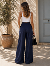 ARIEL | Pantaloni a gamba larga con taschino laterale a bottone