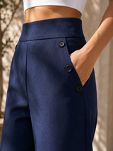 ARIEL | Pantaloni a gamba larga con taschino laterale a bottone