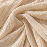 SOLAINE | La robe longue asymétrique à boucle à la taille