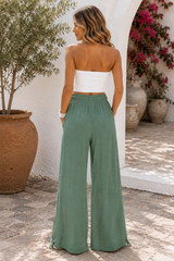 REMA | Le pantalon ample à taille smockée et cordon de serrage